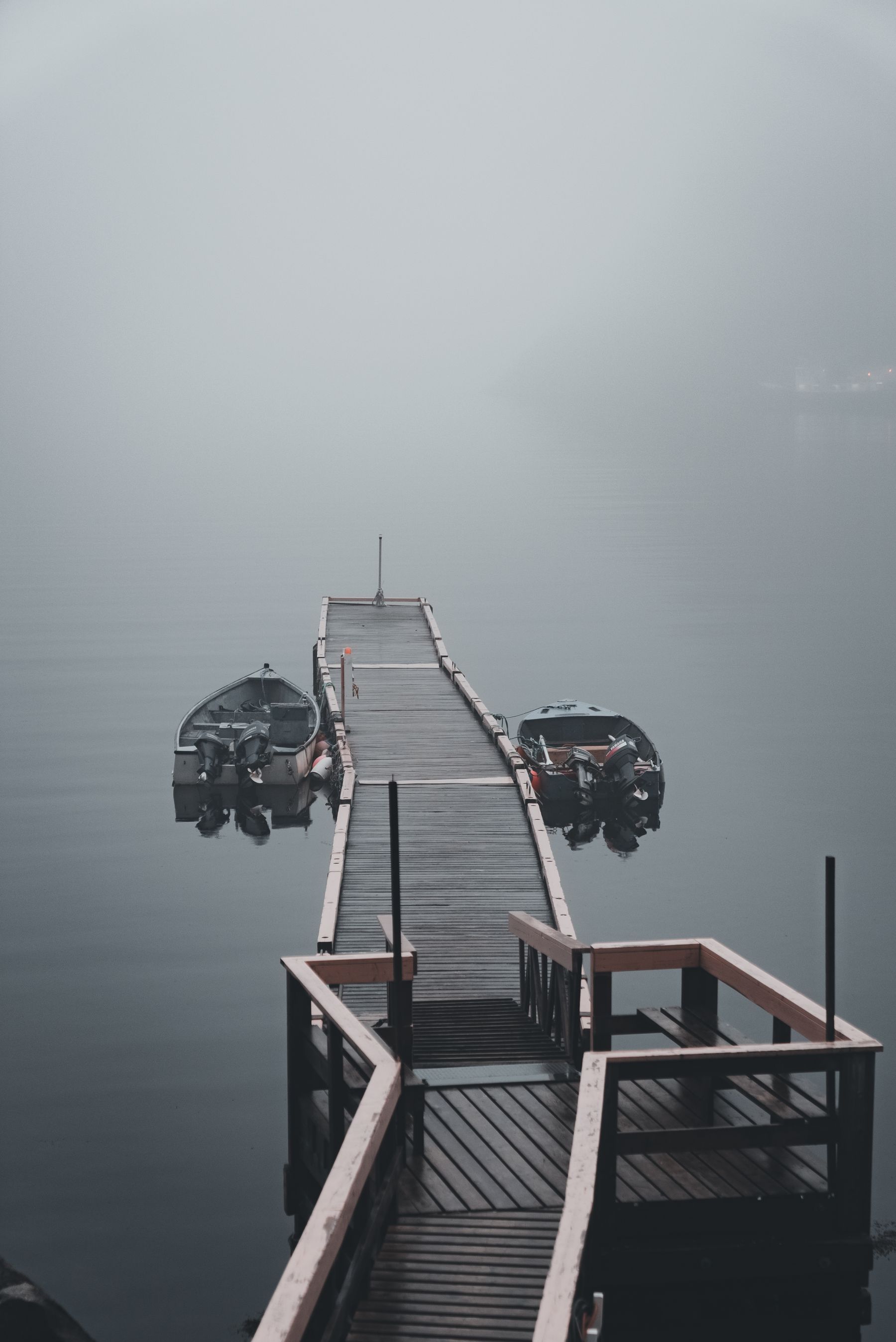 A misty pier at dawn