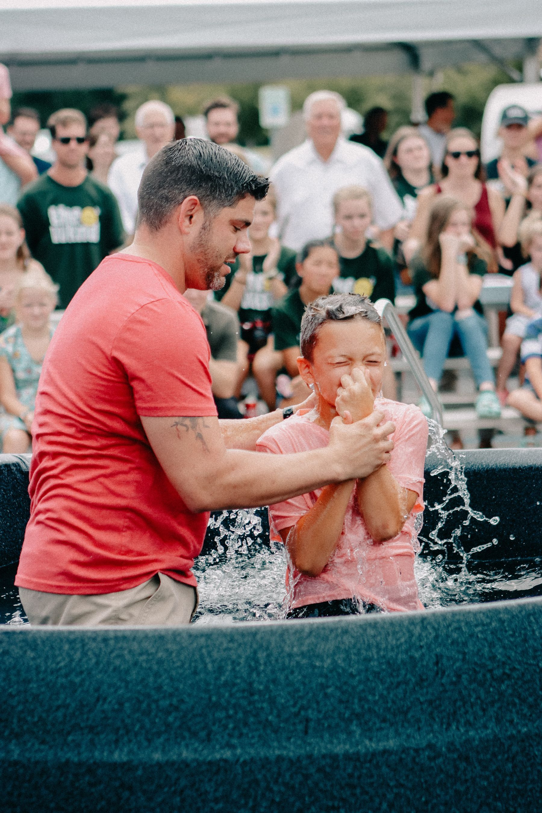 A joyful outdoor baptism